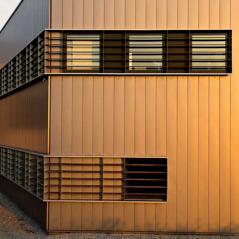 Aulson Roofing | New England commercial metal siding installation