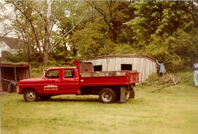 Aulson Roofing | New England Roofing Red Pickup Truck