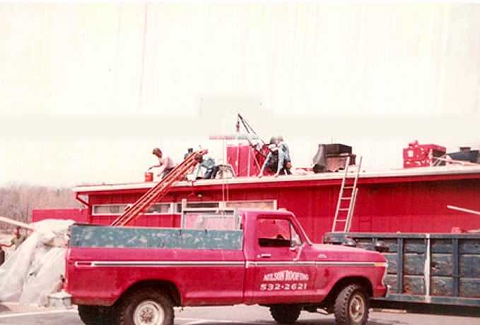 Aulson Roofing | New England Roofing Specialist Red Truck